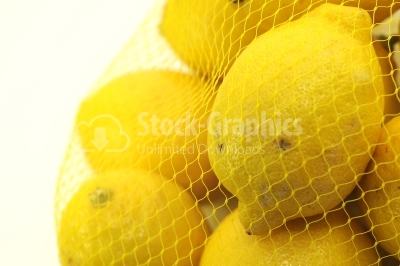 Bag of lemons isolated on white