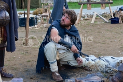 Blacksmith working on a medieval festival