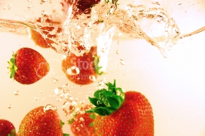 Bubbly fruit, strawberries - Stock Image
