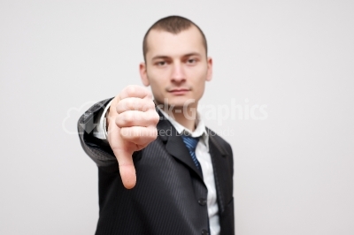 Businessman Gesturing Thumbs Down