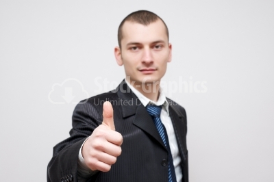 Businessman Gesturing Thumbs Up