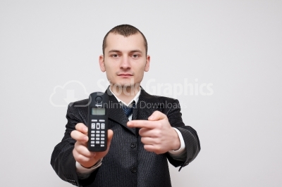 Businessman pointing on mobile phone