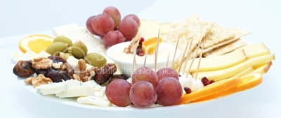 cheese plate - various types of cheese, grapes green and wallnut