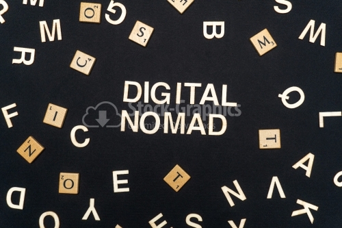 DIGITAL NOMAD word written on dark paper background. DIGITAL NOMAD text for your concepts