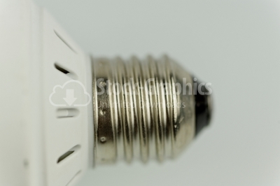 Energy saving fluorescent light bulb on white  - Stock Image