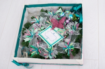 Gift box filled with christmas wreath