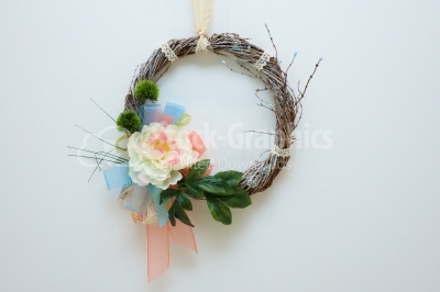 Hand made spring wreath on white background