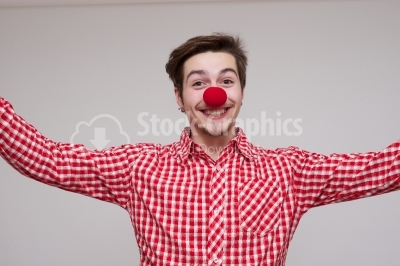Happy young with red nose