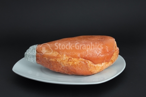 Prague ham on a white plate
