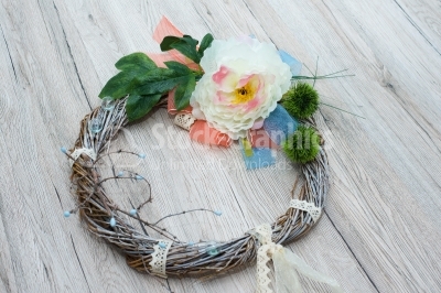 Rutsic wreath on wood background
