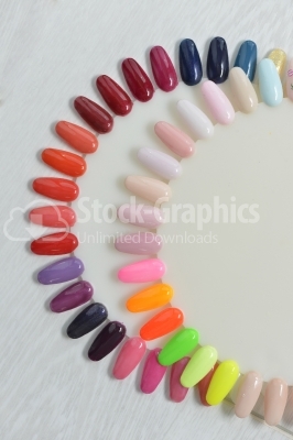 Samples of nail varnishes on a white parquet