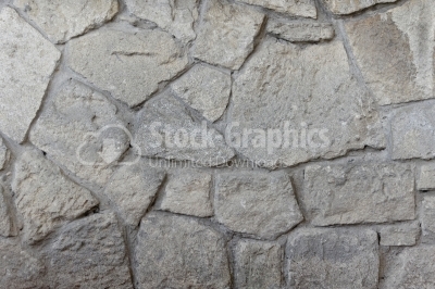Stone wall surface with cracks