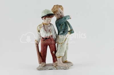 Two brothers porcelain figure fighting isolated on white