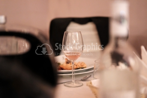 Wine glass on the table of a restaurant