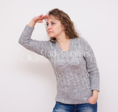 Woman looking far away, over a white background