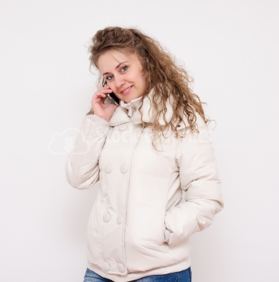 Woman talking with cellphone and smiling