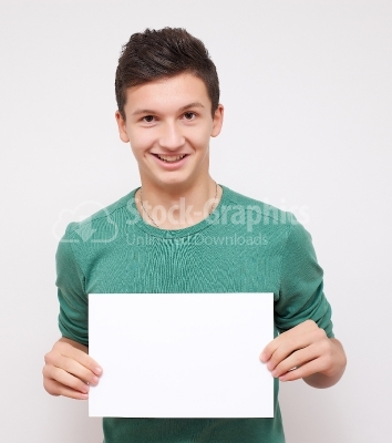 A smiling handsome male with blank board