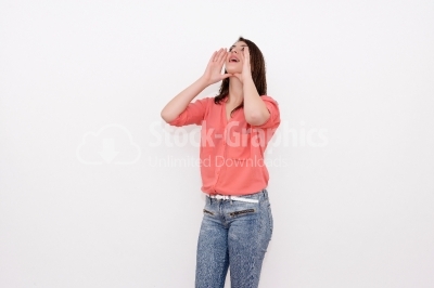 A very frustrated and angry woman screaming. Isolated on white.