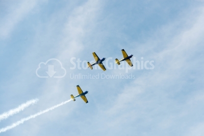 Air stunts performed on the cloudy sky