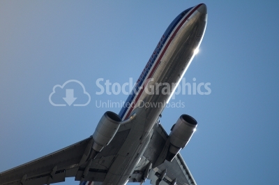 Airplane close-up in bright sky