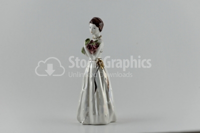 Antique female porcelain figurine - Stock Image