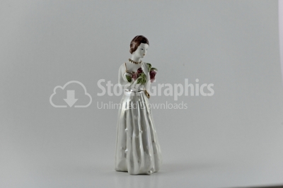 Antique female porcelain figurine photo