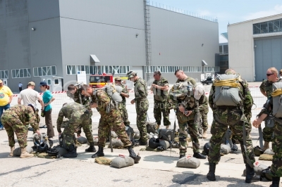 Army team costumed and equipped to jump 