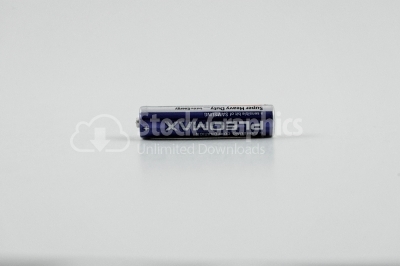 Battery on white - Stock Image