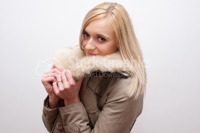 Beautiful blonde woman in winter time