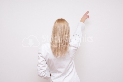 Beautiful female doctor. Rear view - Stock Image