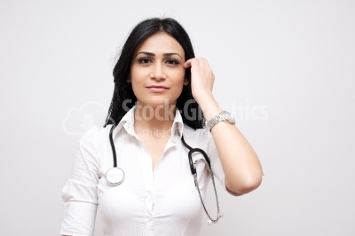 Beautiful female doctor with stetoscope