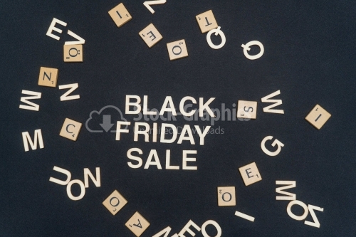 BLACK FRIDAY SALE word written on dark paper background. BLACK FRIDAY SALE text for your concepts