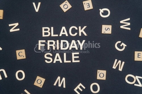 BLACK FRIDAY SALE word written on dark paper background. KEYWORDS text for your concepts
