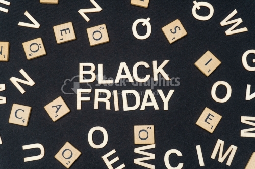 BLACK FRIDAY word written on dark paper background. BLACK FRIDAY text for your concepts