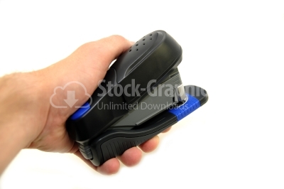 Black professional stapler isolated on white background