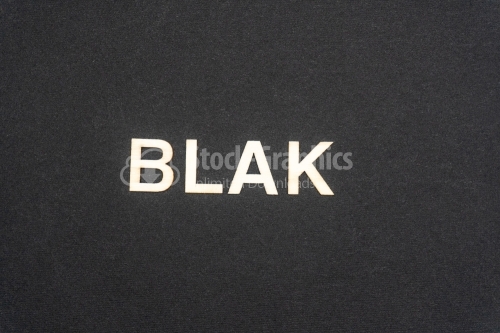BLAK word written on dark paper background. BLAK text for your concepts