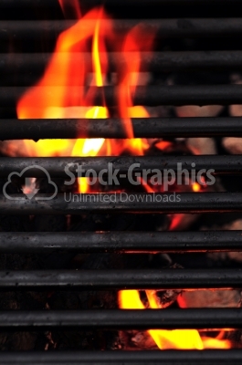 Blazing fire in grilled - close up