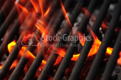 Blazing fire in grilled - close up