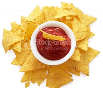 Bowl of salsa with tortilla chips top view