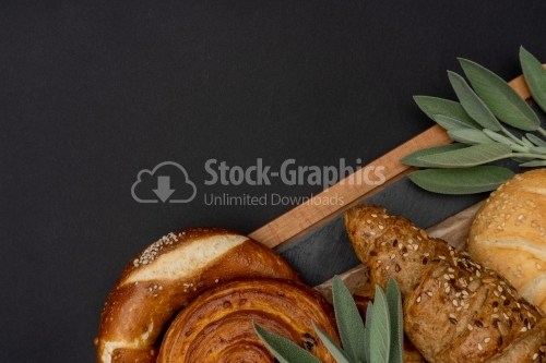 breads over a dark cooking board
