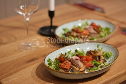 Bruschettas with liver pate, tomatoes and sauteed mushrooms.