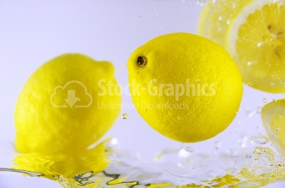 Bubbles in water and lemons - Stock Image