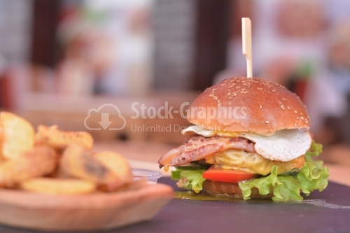 Burger with chicken and vegetables