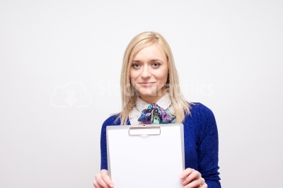 Business woman holding a white clipboard
