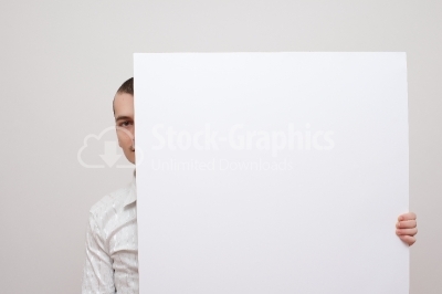 Businessman behind a white board