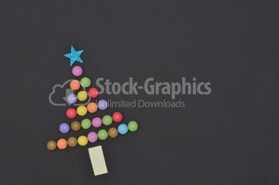 Candies Christmas tree with blue star