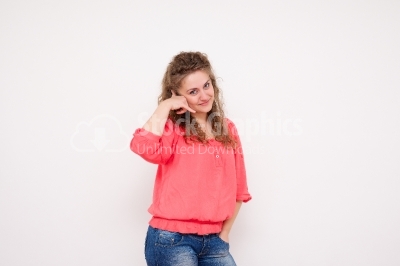 Cheerful woman gesturing call me