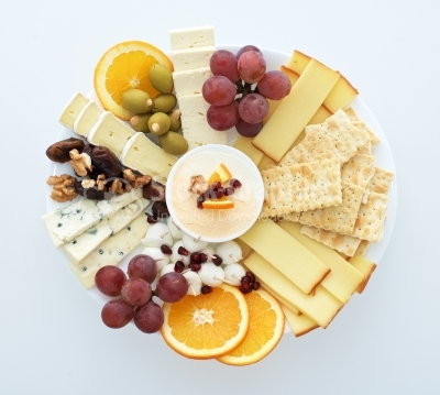 Cheese plate with grapes, bread, walnut