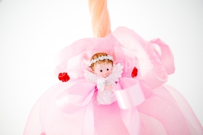 Christening candle with small angel figurine