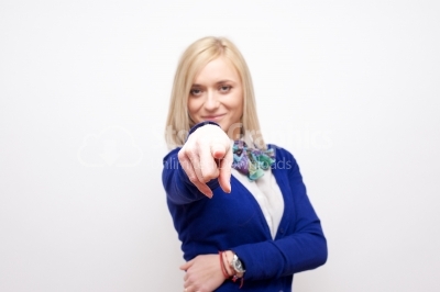 Close-up of a young woman pointing